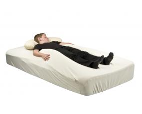 Young boy on a Symmetrisleep on a white background.