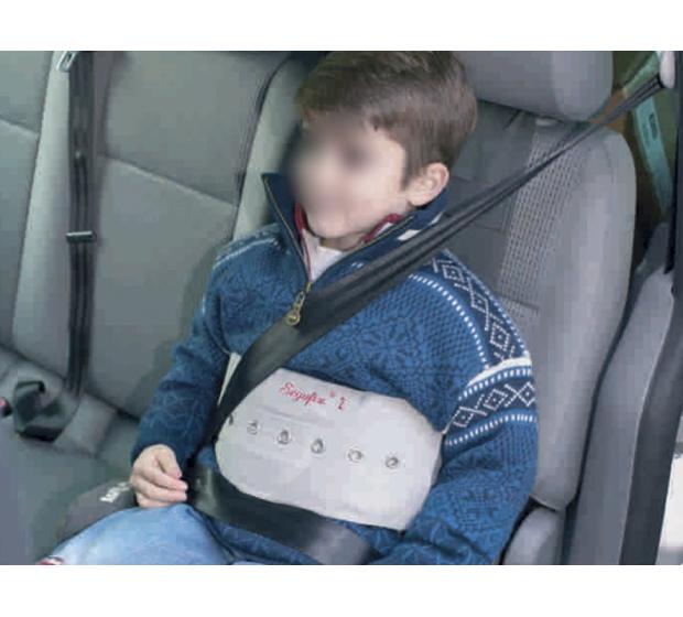 Houdini harness cross strap accessory providing enhanced shoulder control