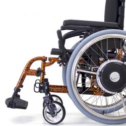 Quickie Xtender power assist wheels with automatic wheel synchronisation for smooth, responsive manual propulsion.