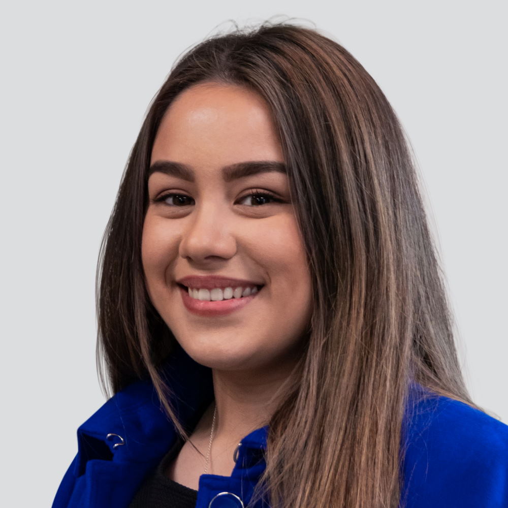Paediatric Sales Specialists, Suzena Yates, smiles warmly, reflecting her passion for helping others through clinical expertise.
