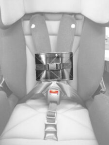 A green Hoggi Cruiser anterior walker offering dynamic support for active children, shown side on facing the left