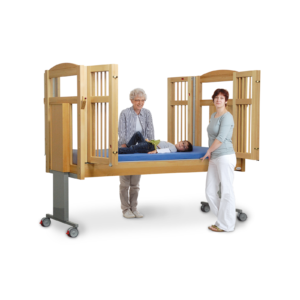 Young boyresting in the Genie Bed System, promoting pressure management and comfort for prolonged bed use.