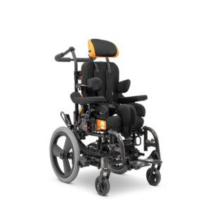 Jenx Multistander with 30-degree abduction enabling young boy to stand safely with hips supported for improved posture and weight bearing.