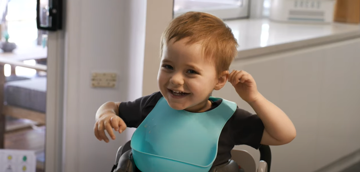 Portrait of Lucas Nowers smiling, showing positive impact of Medifab equipment on mobility and therapy outcomes.