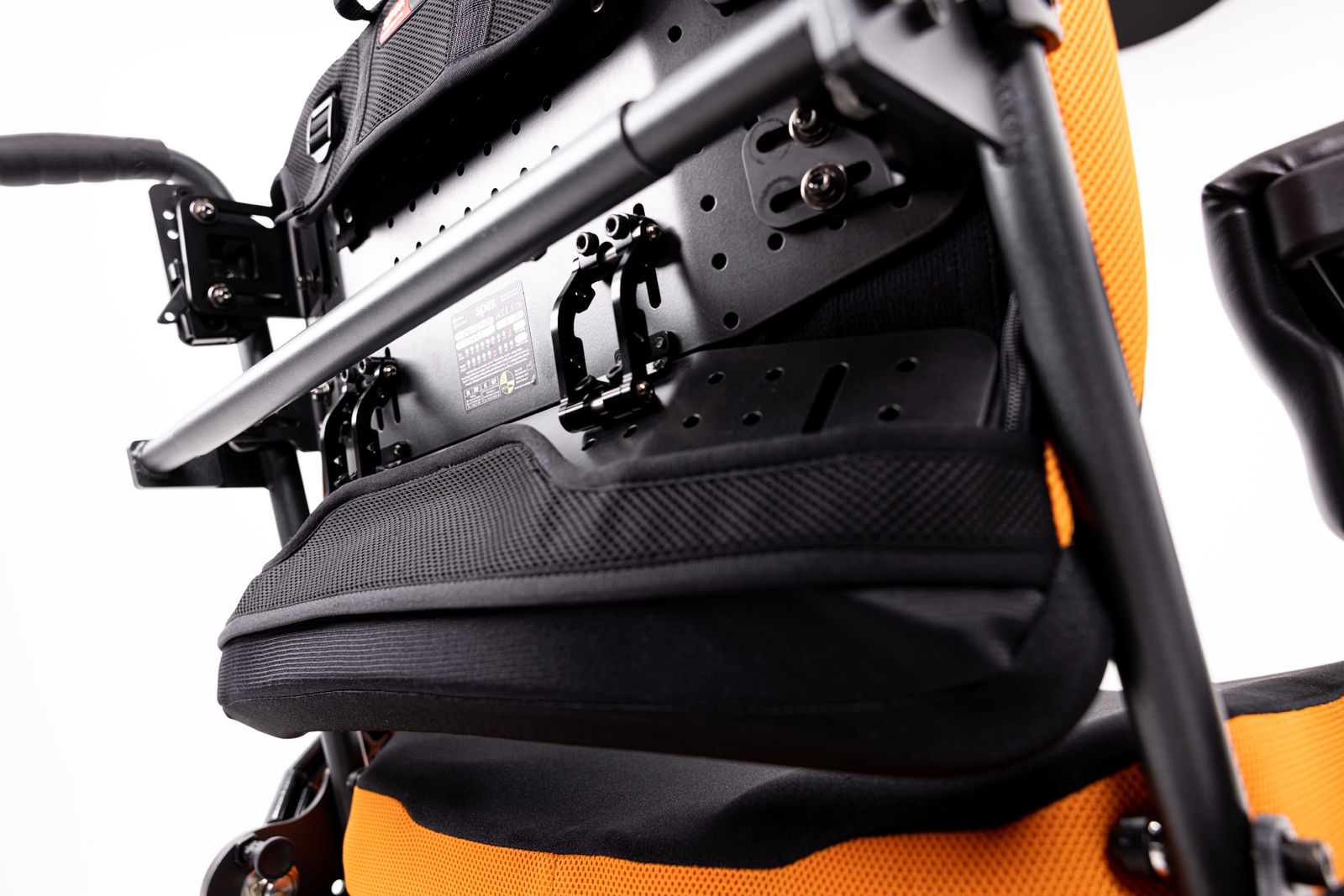 Close-up of Spex XLella2 hinge showing robust, adjustable construction for bariatric back support.