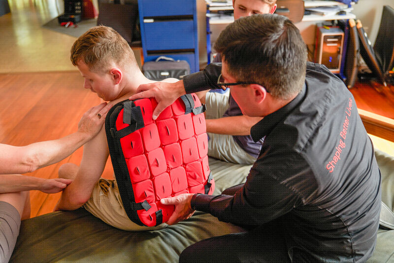 Bruce adjusting Callums equipment