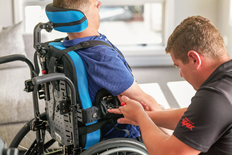 Levi adjusting Callums equipment