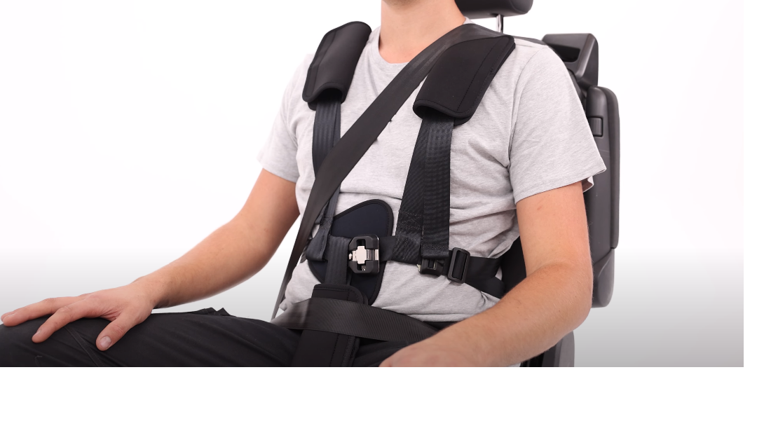 Man strapped into a Houdini harness.