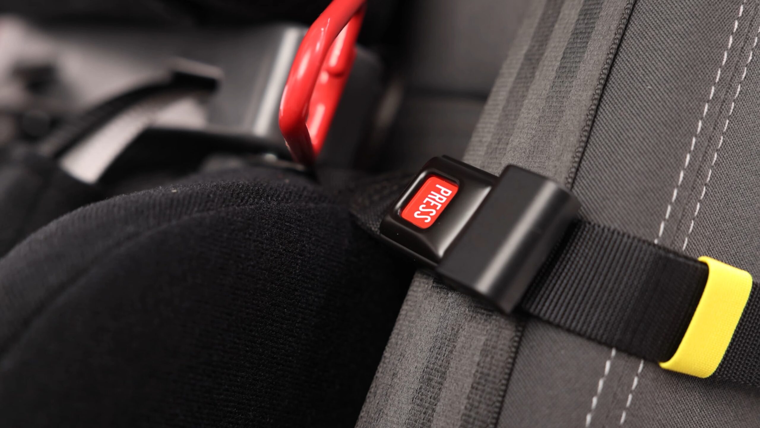 Carseat harness for airplanes.