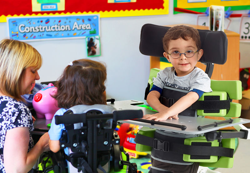 Young boy enjoying using a Jenx Multistander