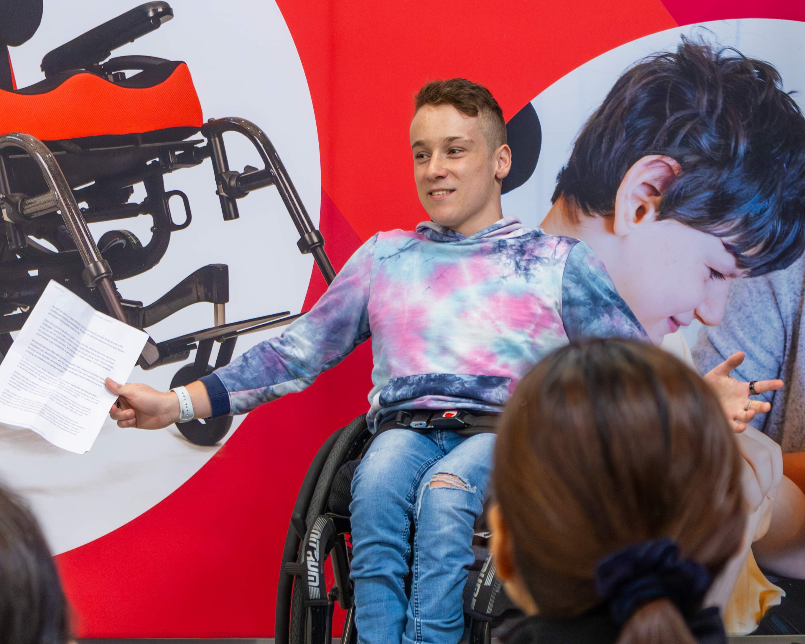 Jaden Movold visits Spex, engaging with assistive tech that empowers his competitive and daily life.