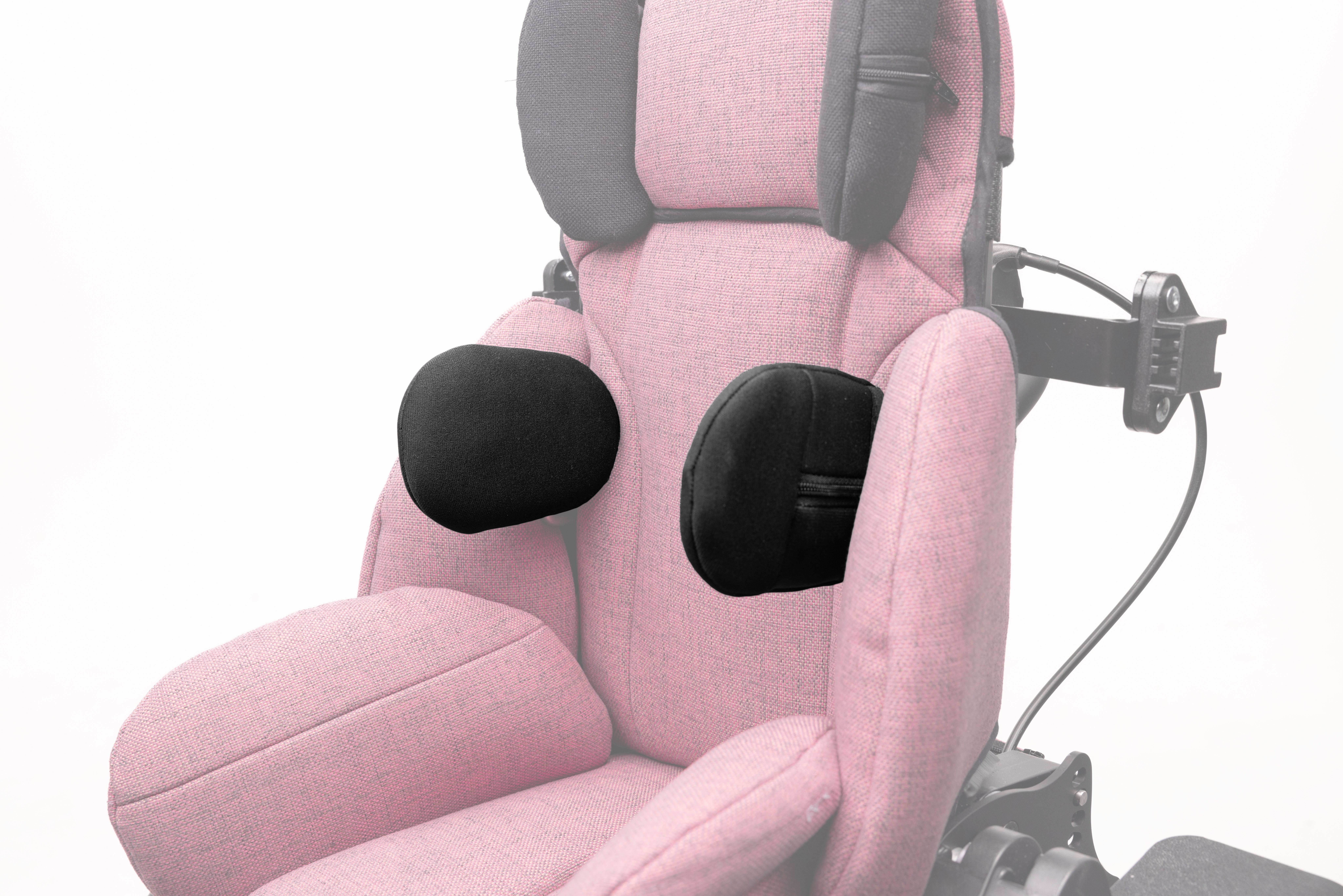 Ghosted image of Bingo Evo Spex Bingo Straight Narrow Lateral Supports on a pink stroller.