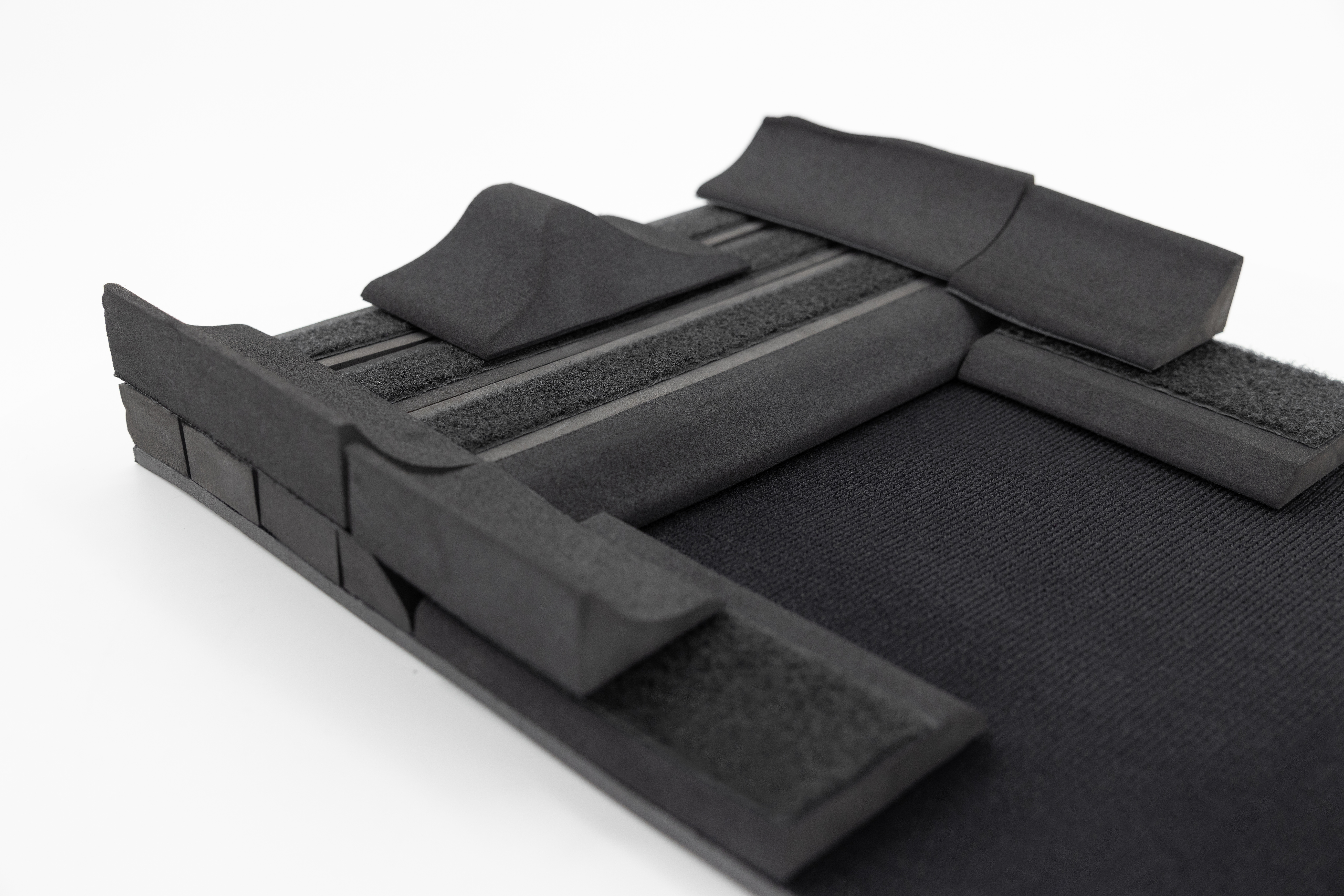 Close up of Spex Wonderseat Constructa Cushion without cover on a white background.