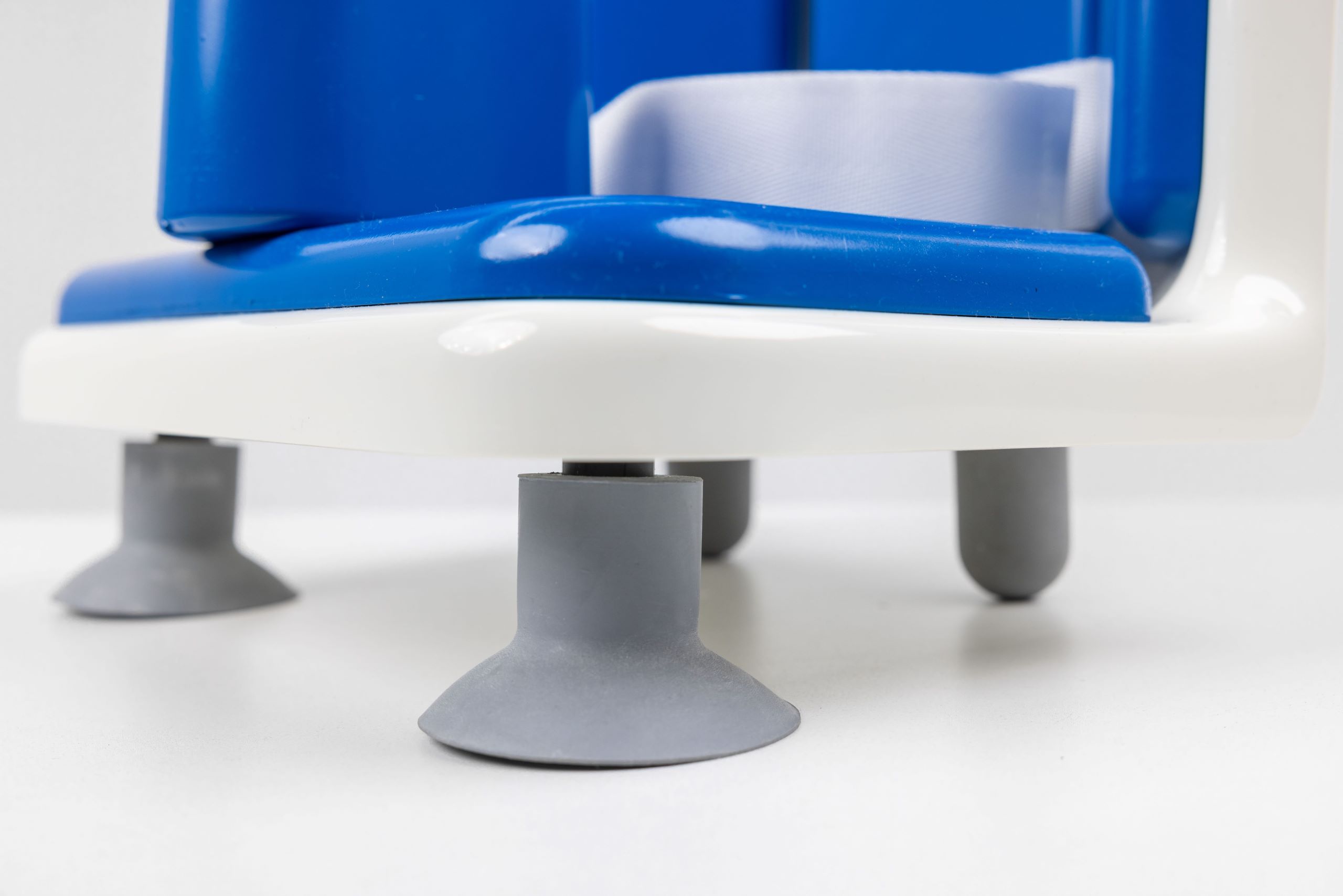 Base suction pads on Smirthwaite Bath Corner Chair providing secure grip for stability during bath time.