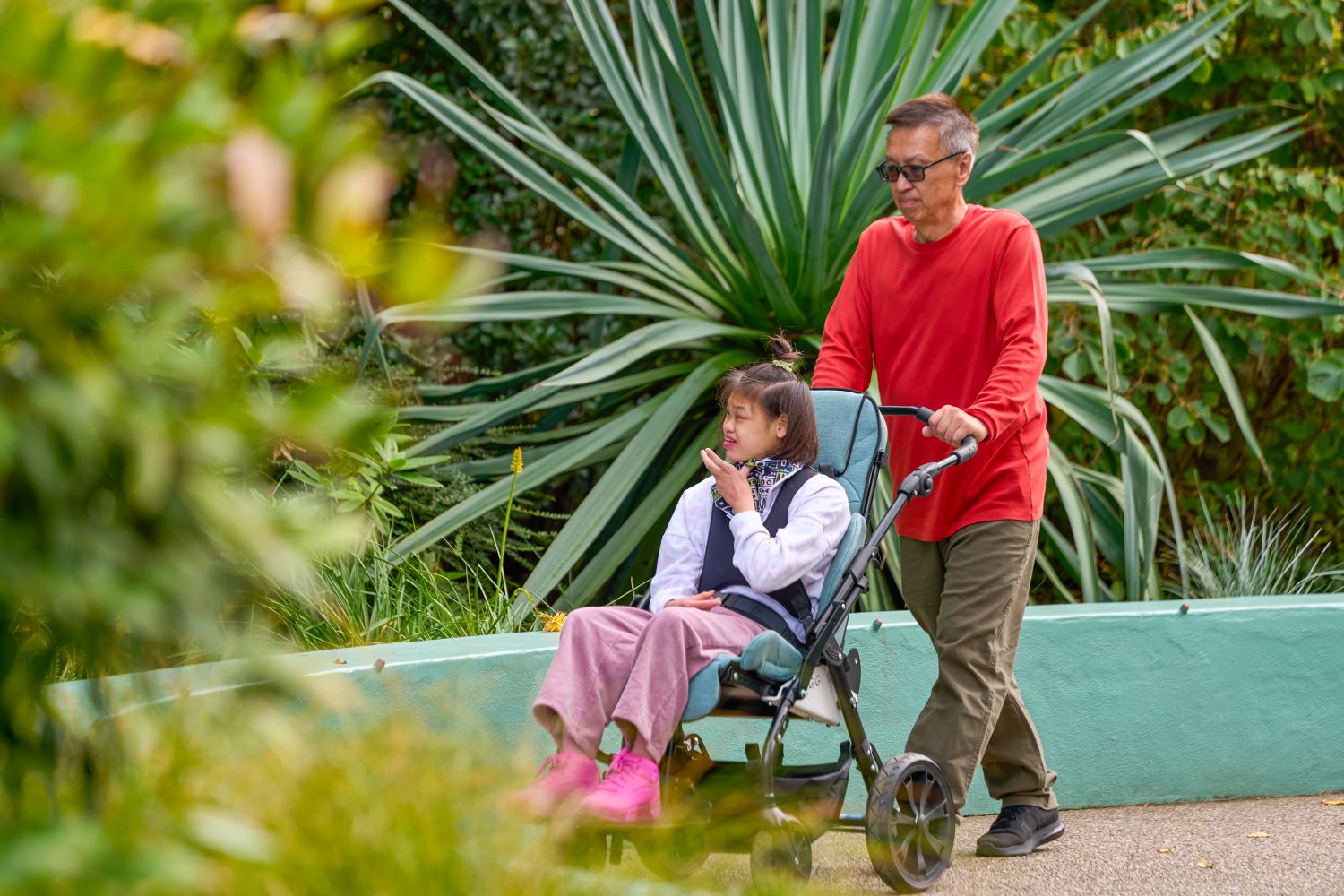 Alyssa travels in her Duro stroller, which offers smooth handling and secure positioning for active daily use