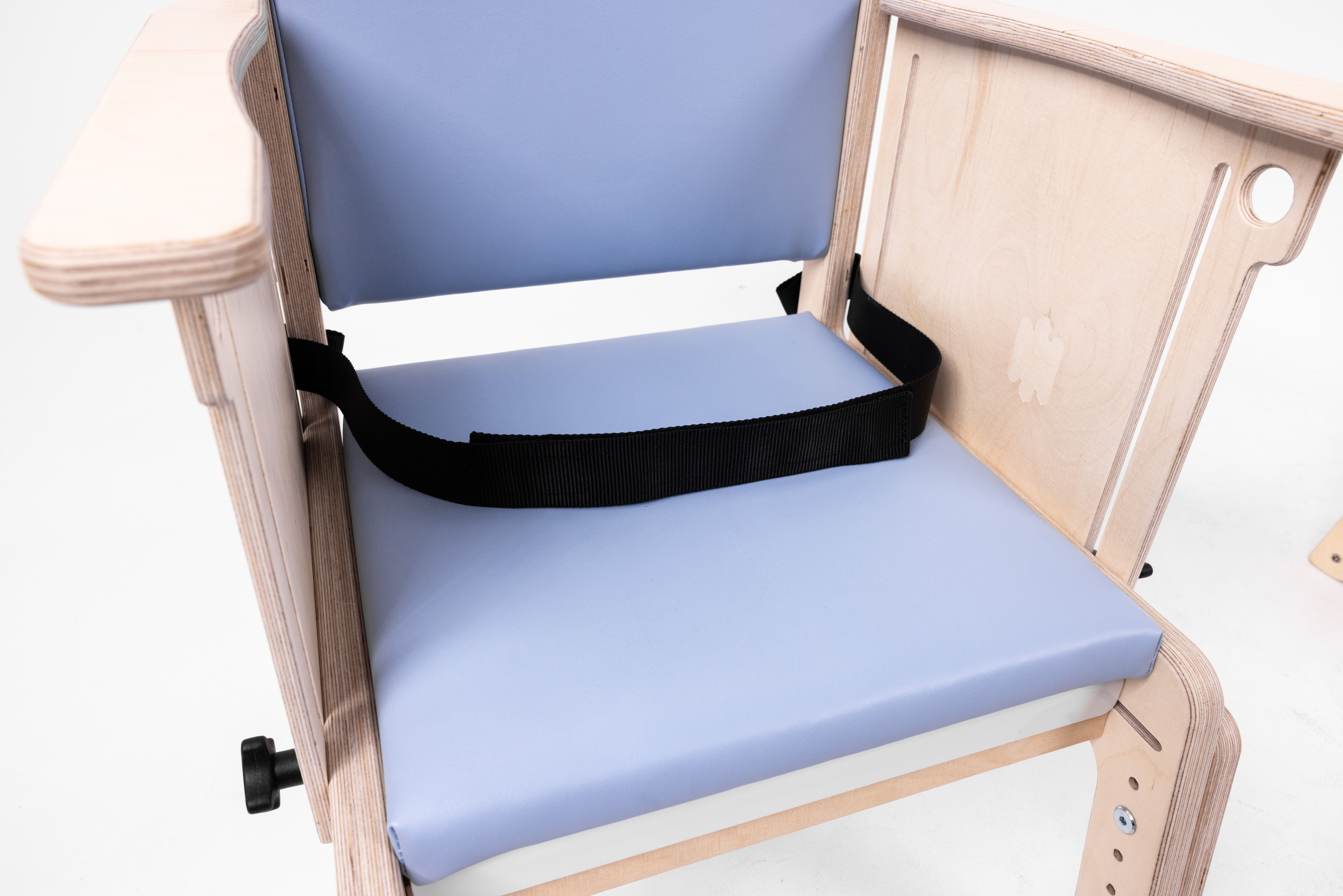 Smirthwaite Combi Chair with lap strap offering postural support and security during seated activities.