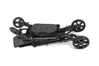 Folded up black stroller lying horizontally.